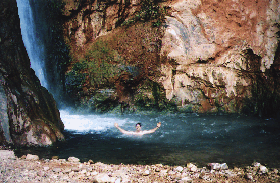 Steve takes a dip at the Deer Creek terminal pour-off (blue water on the Colorado!)